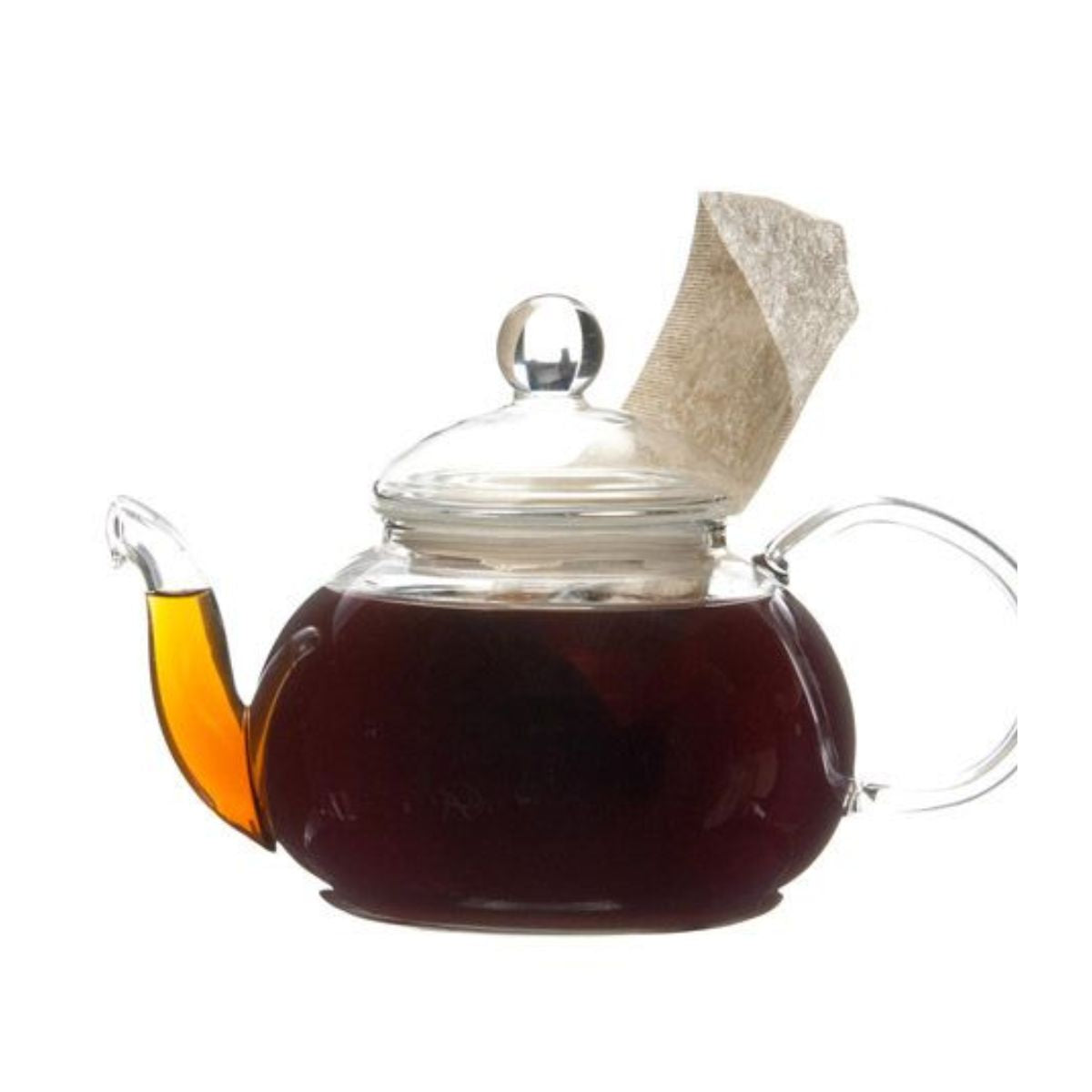 A glass teapot with a visible teabag inside and filled with dark hot tea.
