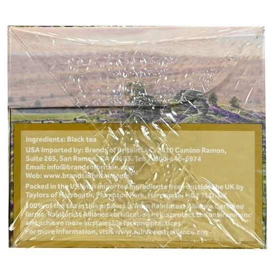 Tea packaging with a scenic image and ingredient list on a white background