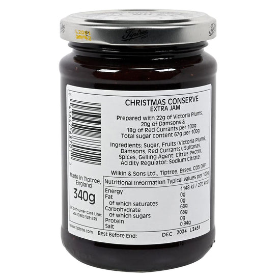 Jar of Tiptree Christmas conserve with label showing ingredients and nutritional information.