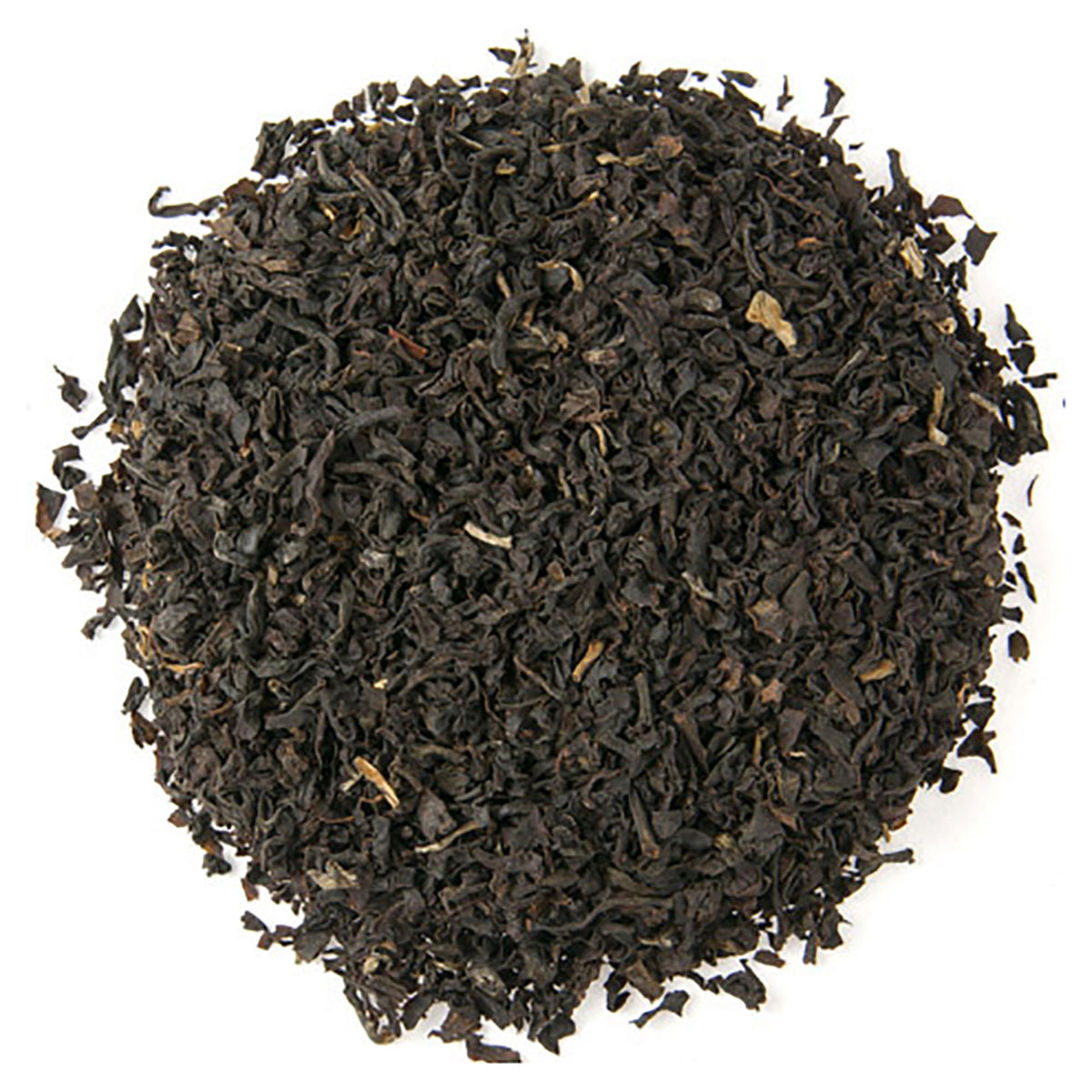 Close-up of black tea leaves on a white background