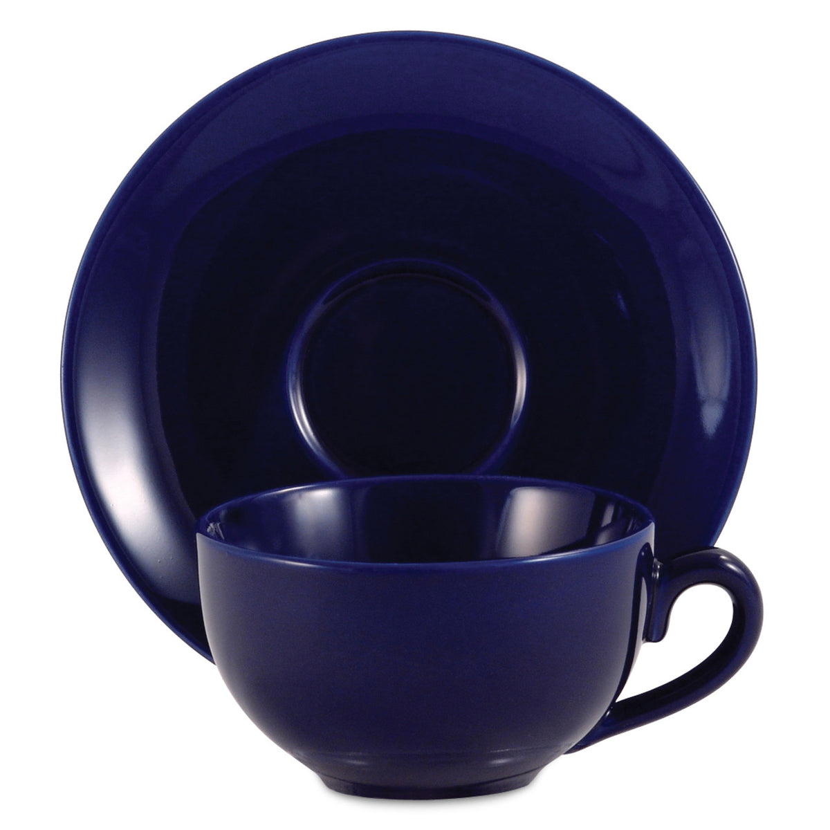 Royal blue ceramic cup and saucer set on a white background