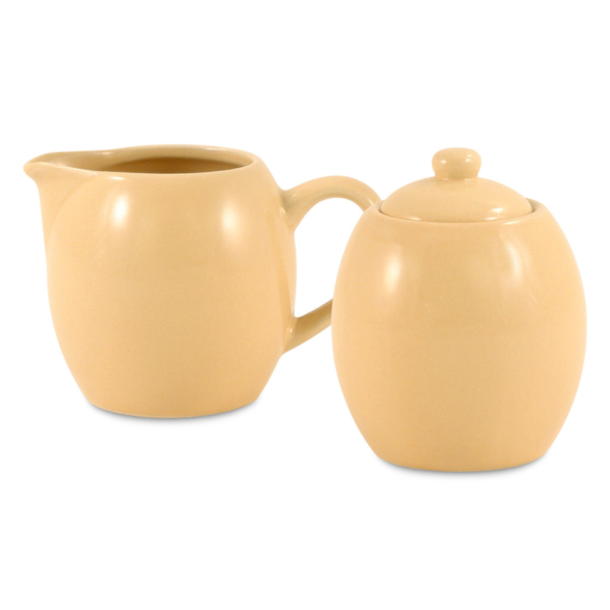 Yellow ceramic creamer and sugar bowl set on a white background