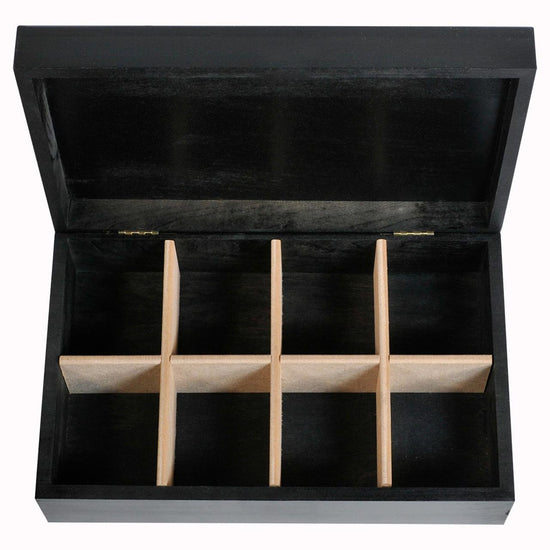 Opened black wooden tea chest box showing 8 slots for tea packages.