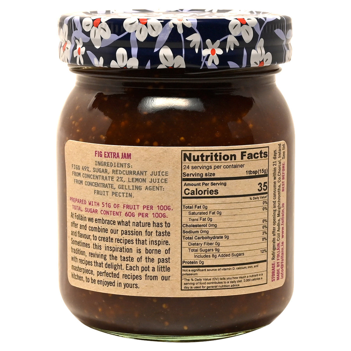 Jar of fig jam with a floral-patterned lid on a white background