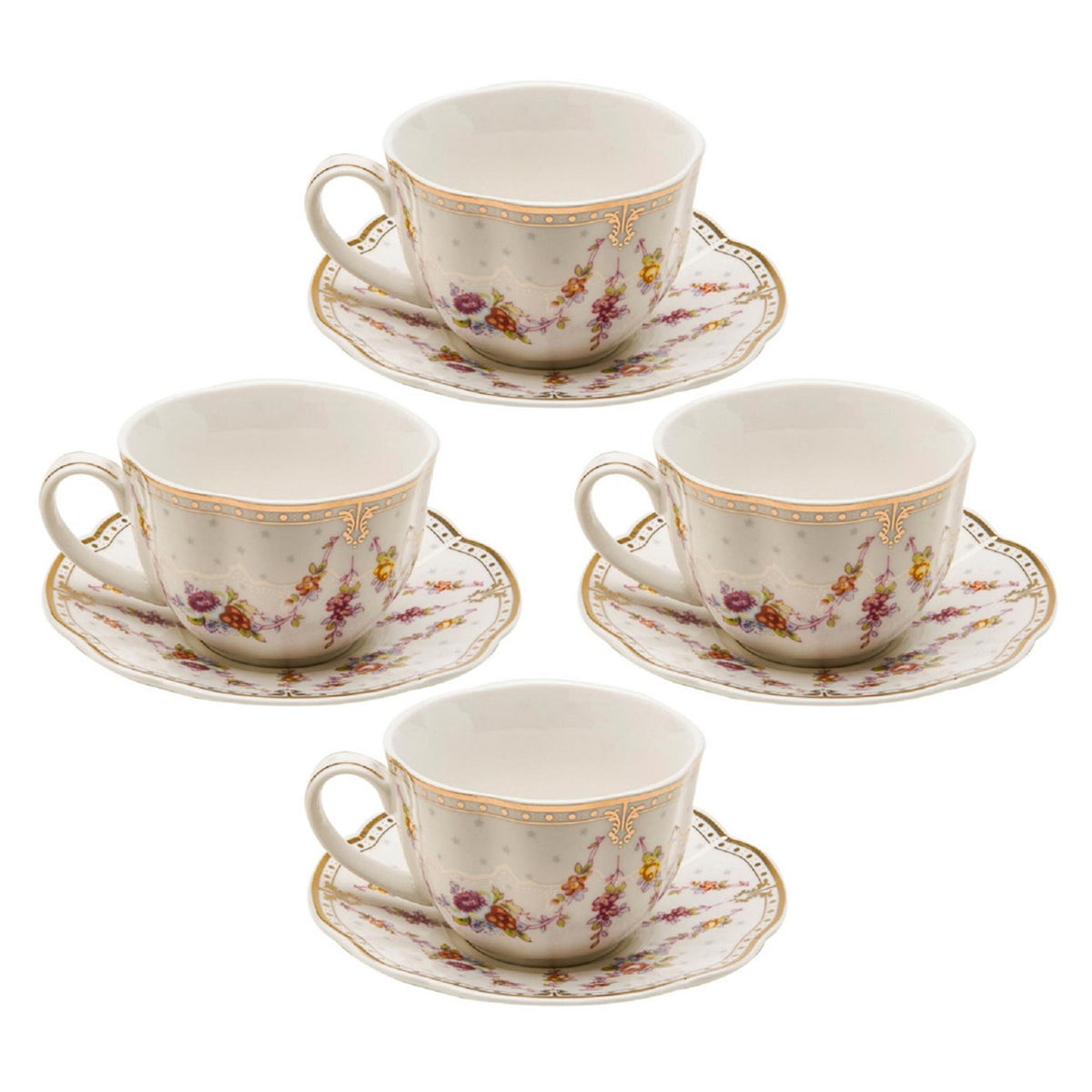 Set of four floral teacups and saucers on a white background