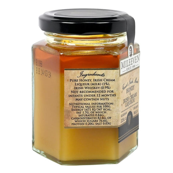 Jar of honey with a label on a white background
