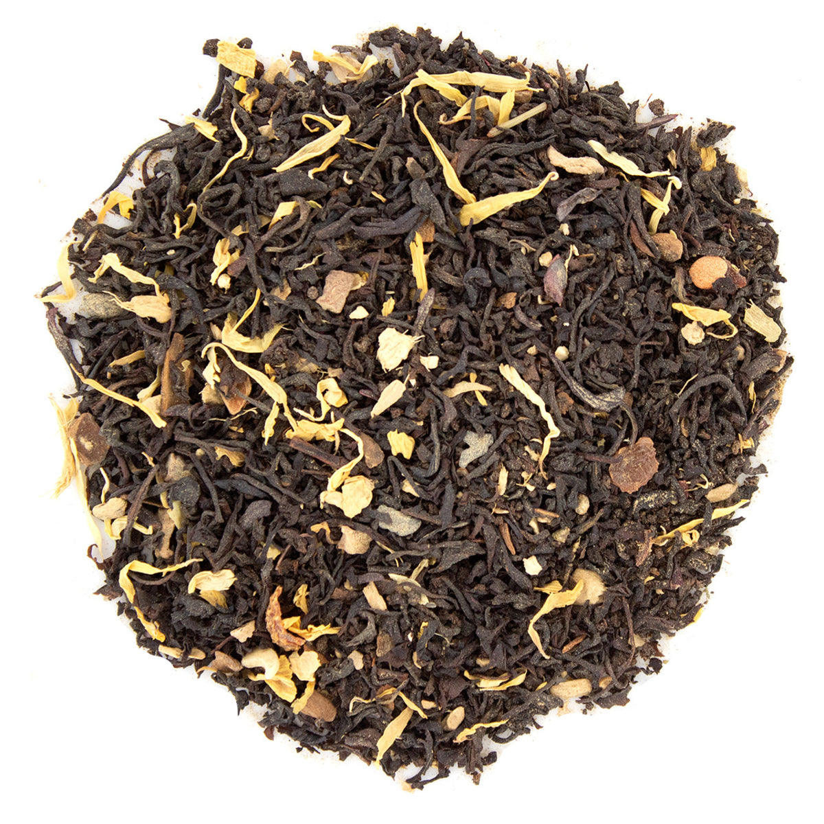 Loose leaf black tea with pieces of cinnamon, ginger, and pumpkin mixed in.