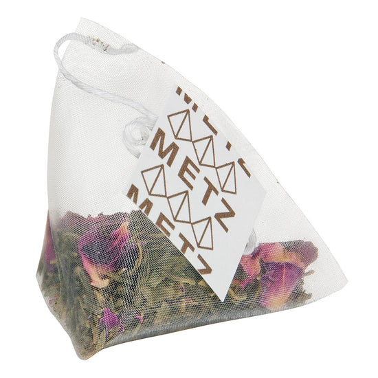Tea bag with visible brand name 'Metz' on a white background