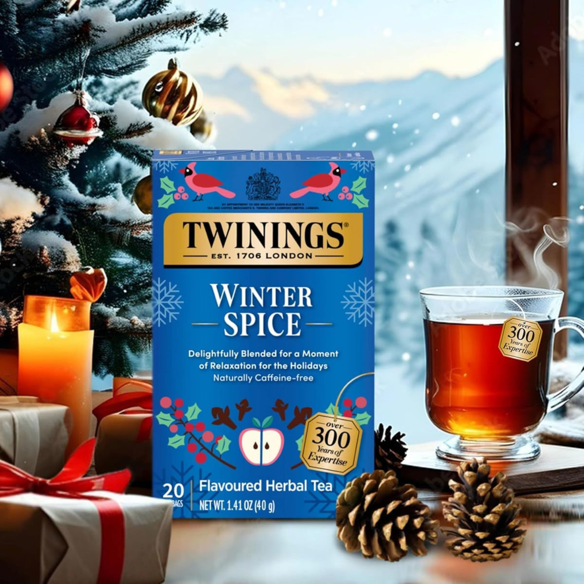 Twinings Winter Spice tea box with a cup of tea and Christmas decorations in the background