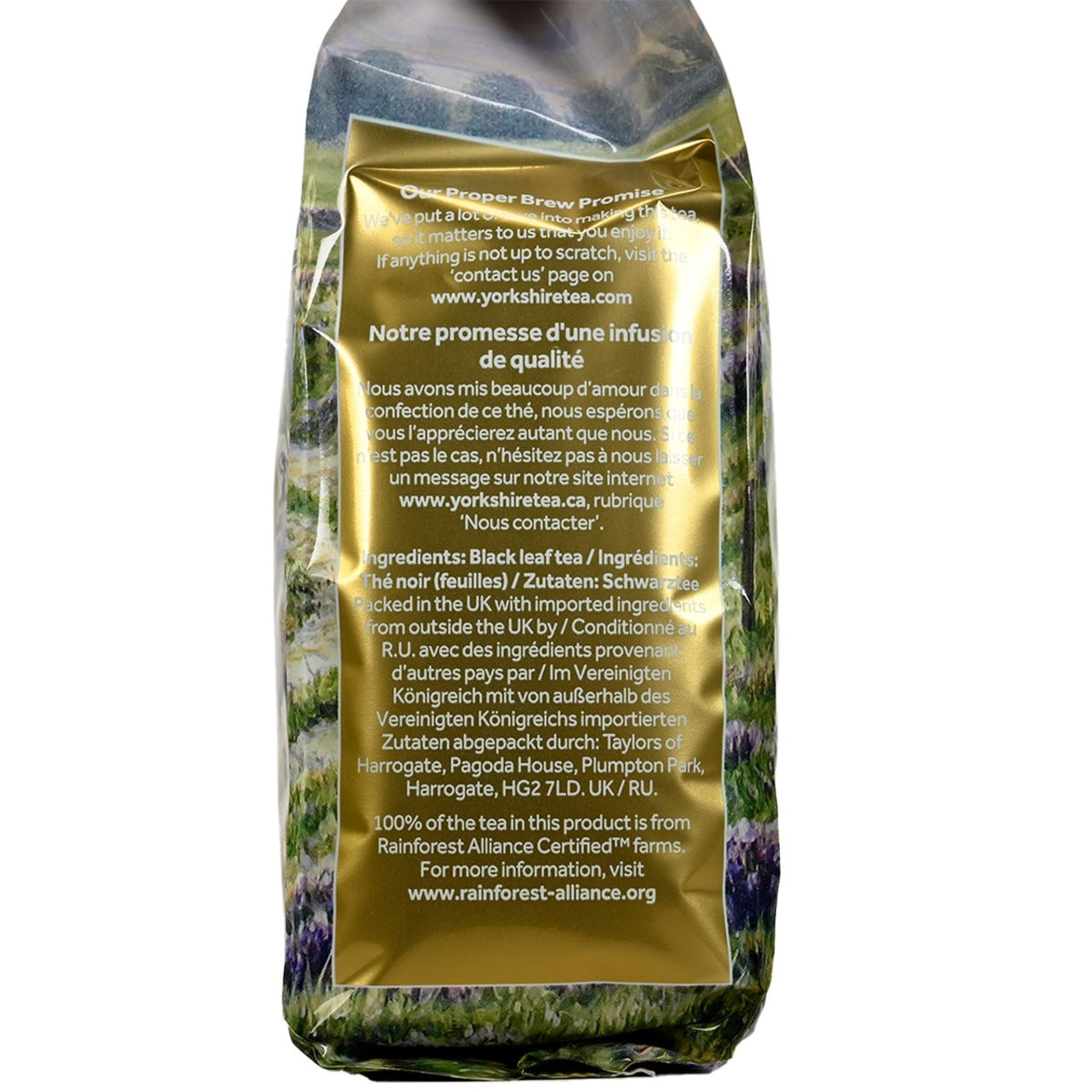 Side of a package of Taylors of Harrogate Yorkshire Gold with ingredient information written in white on a gold background with the bag on a white background