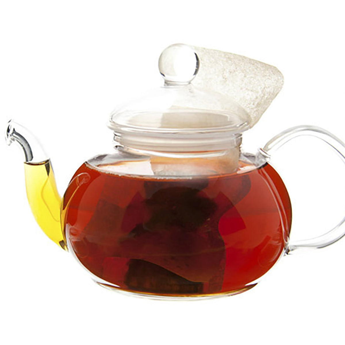 Glass teapot with dark amber colored tea and a teabag
