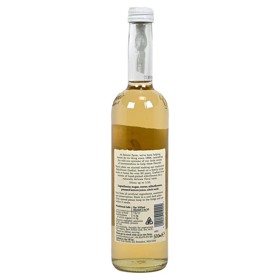 Back Side of a bottle of Belvoir Elderflower Cordial with a label on a white background