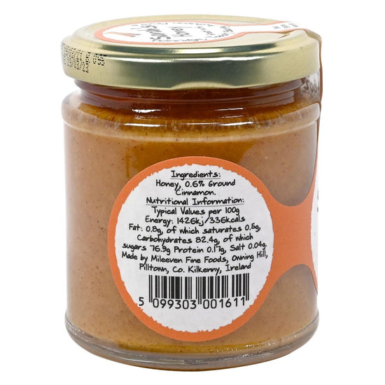 Jar of Sarah's Warming Honey with a label showing ingredients and nutrition information on a white background