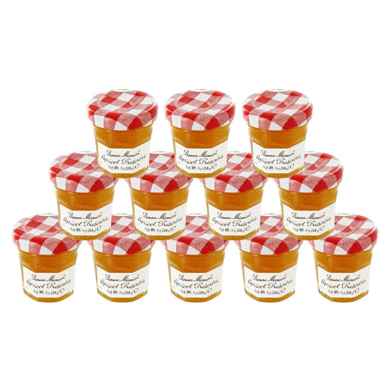 12 1oz jars of Bonne Maman Apricot Preserves with a red and white checkered lid on a white background