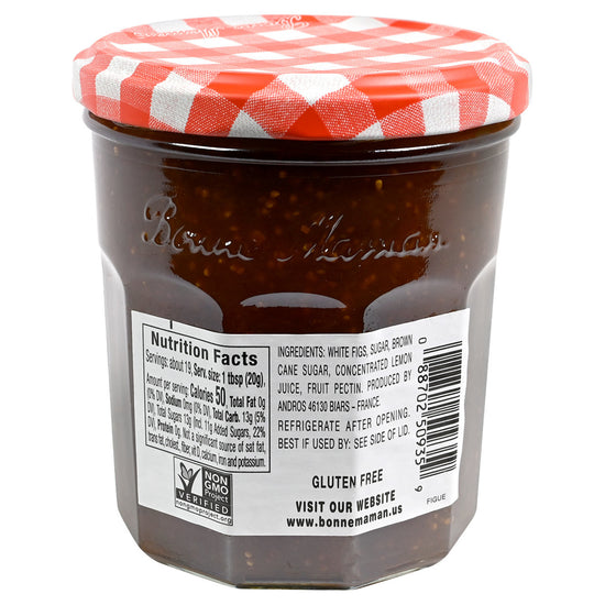 Back label containing ingredients and nutrition of a jar of Bonne Maman Fig Preserves with a red and white checkered lid on a white background