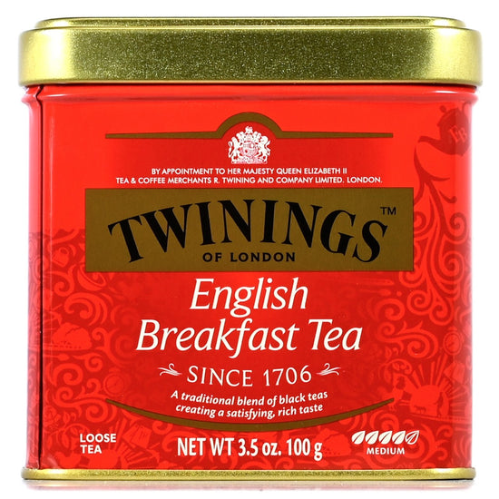 Twinings English Breakfast Tea red can with gold lid on a white background
