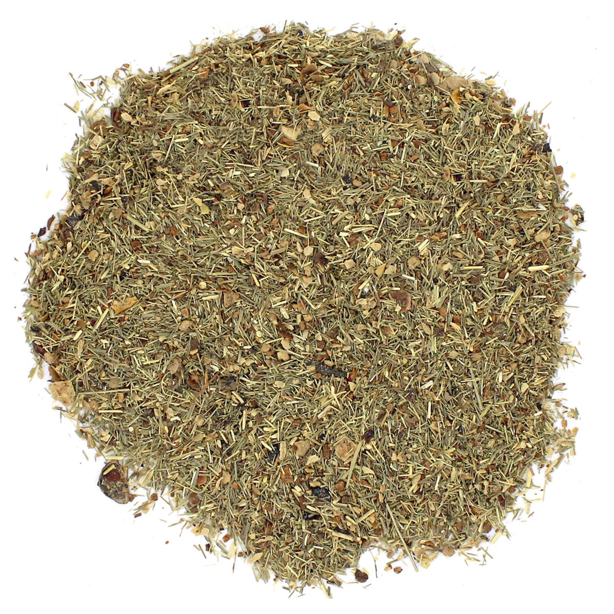 A pile of loose leaf wellness tea with visible spices, ginger, and apple pieces.