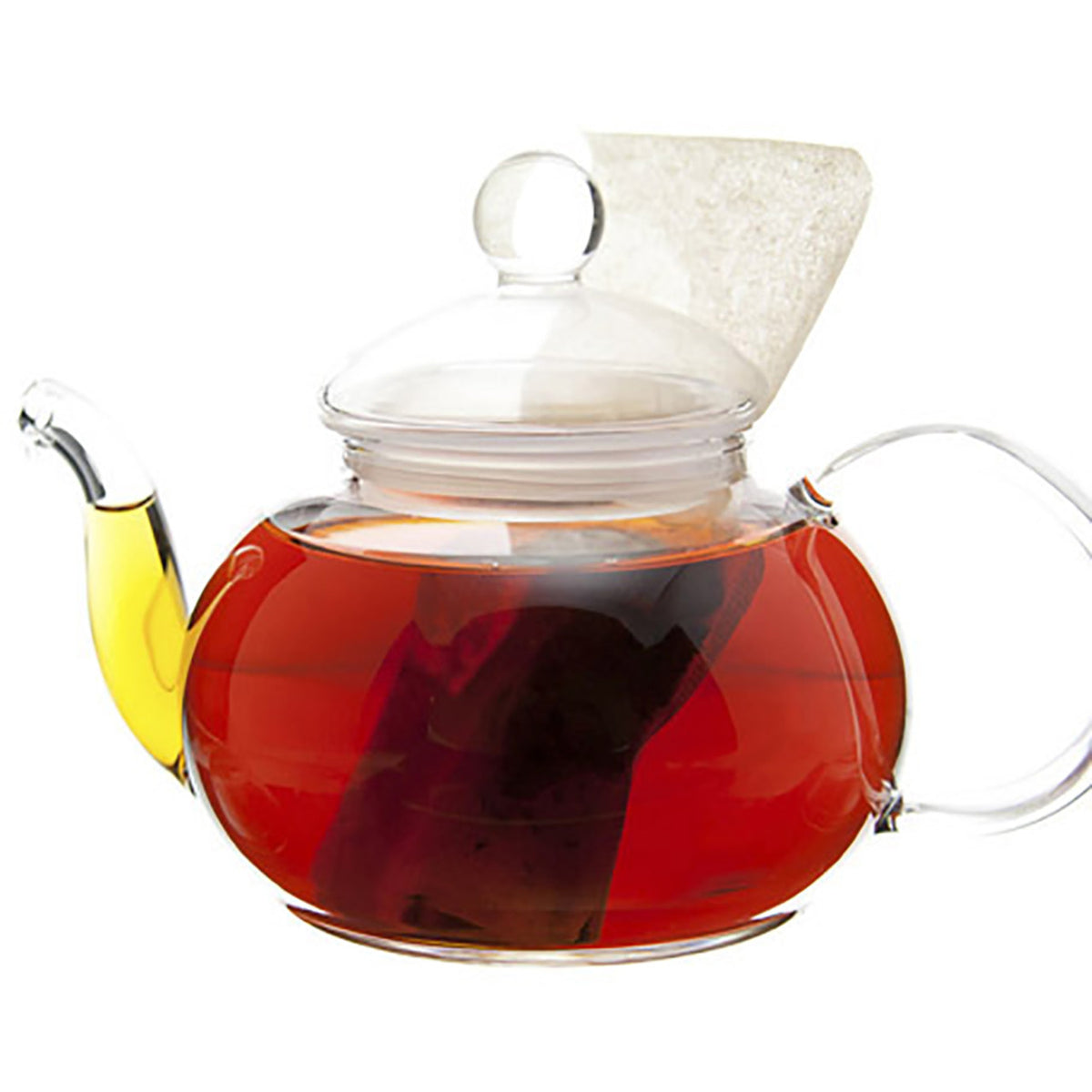 Clear glass teapot with red tea and a tea bag on a white background