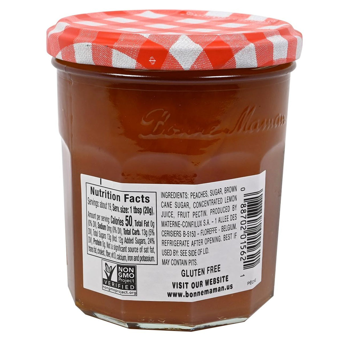 Jar of Bonne Maman peach jam with a red and white checkered lid on a white background