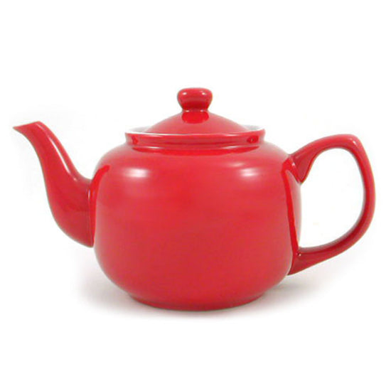 Red teapot on a white background