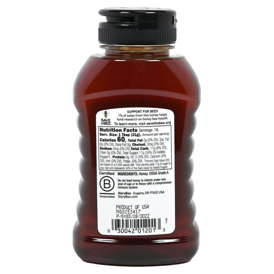 GloryBee honey bottle with label on a white background