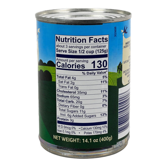 Can of Ambrosia Devon Custard with nutrition facts label on a white background