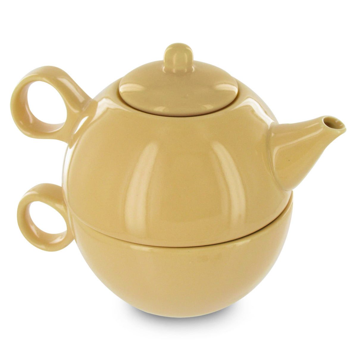 Yellow ceramic tea for one tea set featuring teapot with lid stacked on a teacup all on a white background