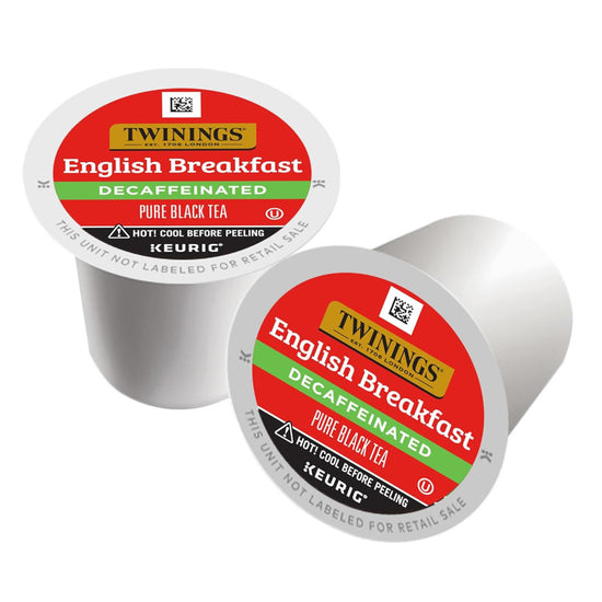 Two Twinings English Breakfast Decaffeinated tea K-cup capsules on a white background