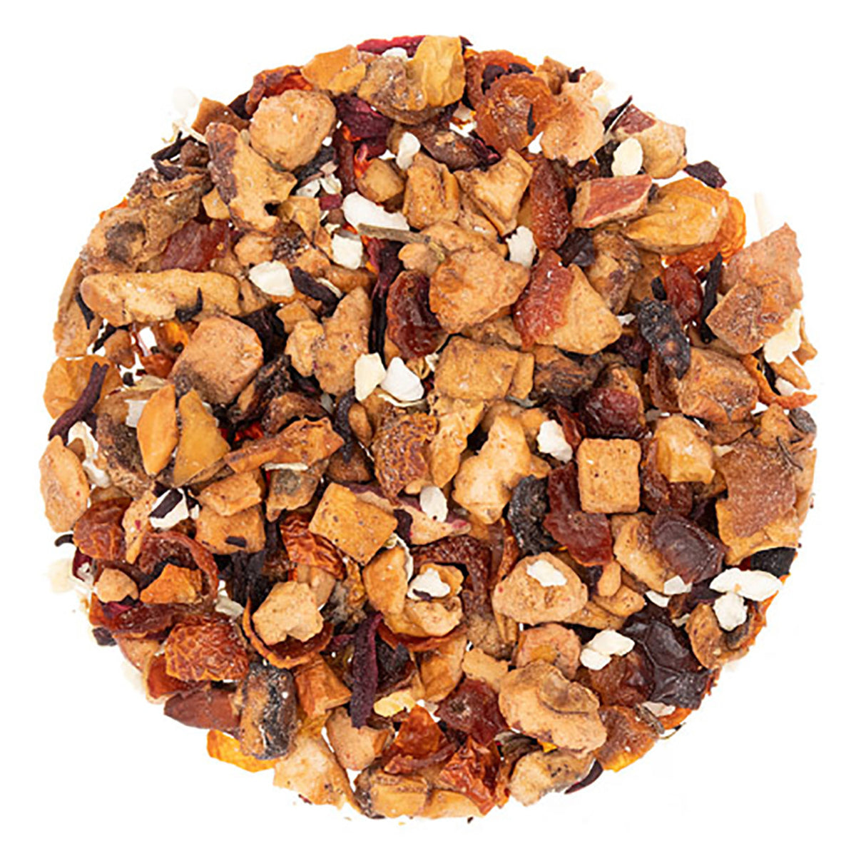 Mixture of dried fruit pieces, nuts, and tea leaves on a white background