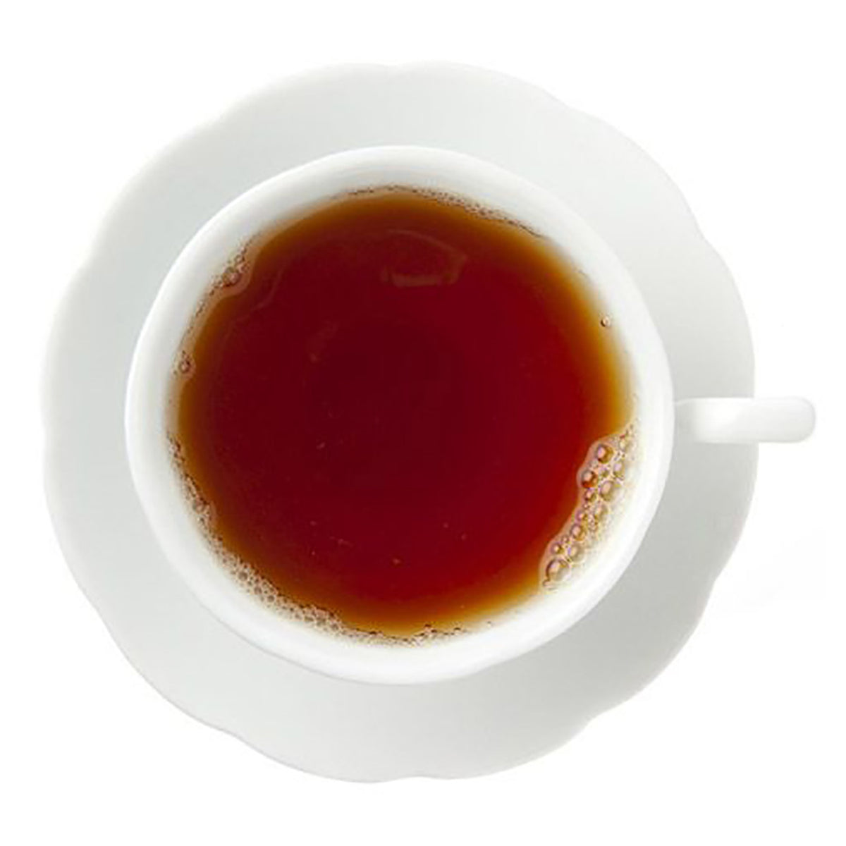 White cup and saucer with a dark amber hot tea on a white background