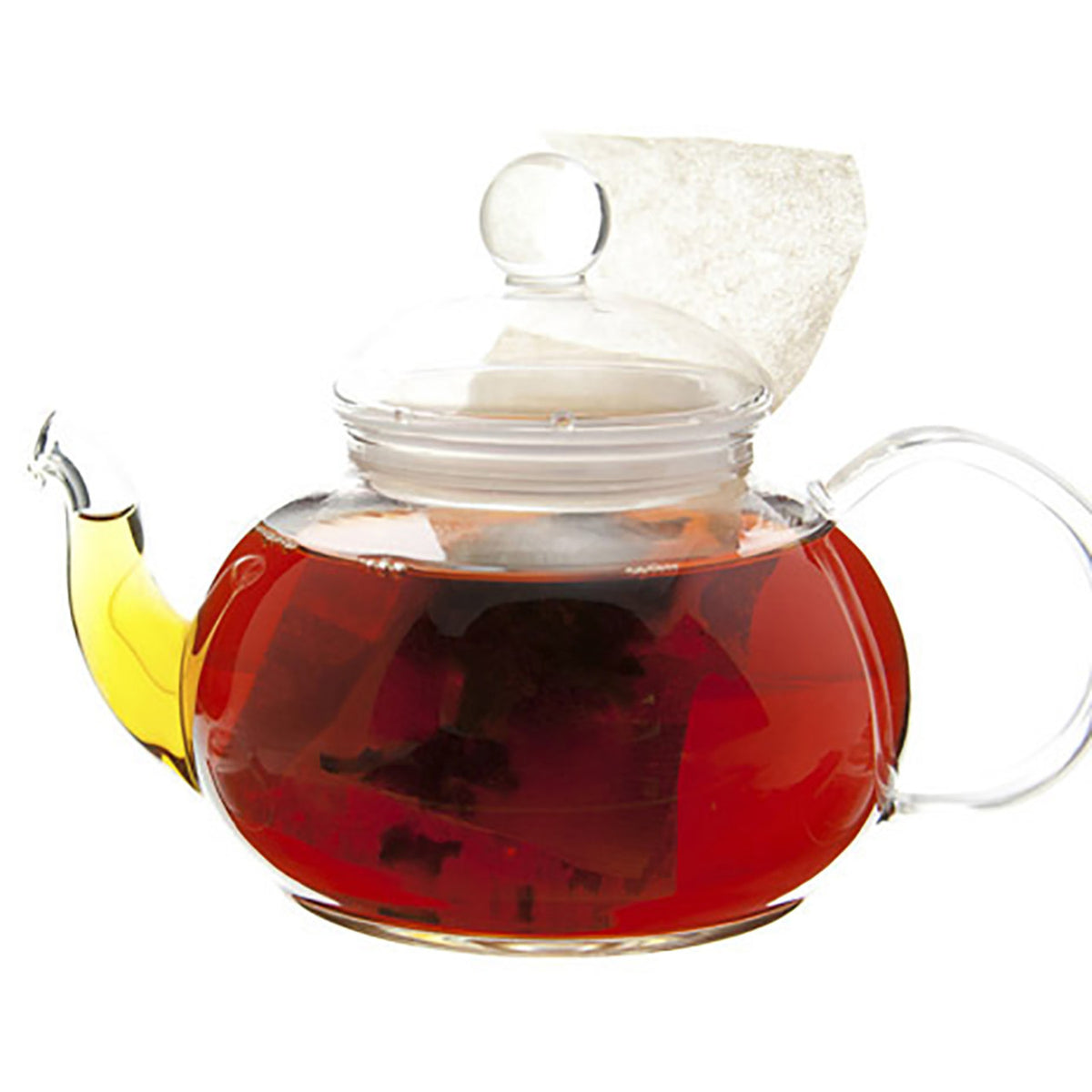 Clear glass teapot with a lid filled with red tea on a white background