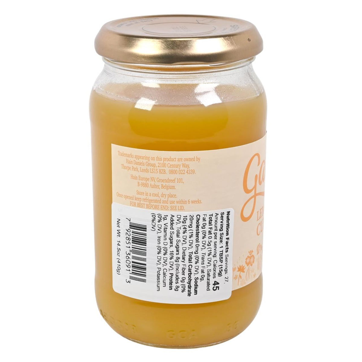 Side view of a jar of Gale's Lemon Curd with a gold lid on a white background
