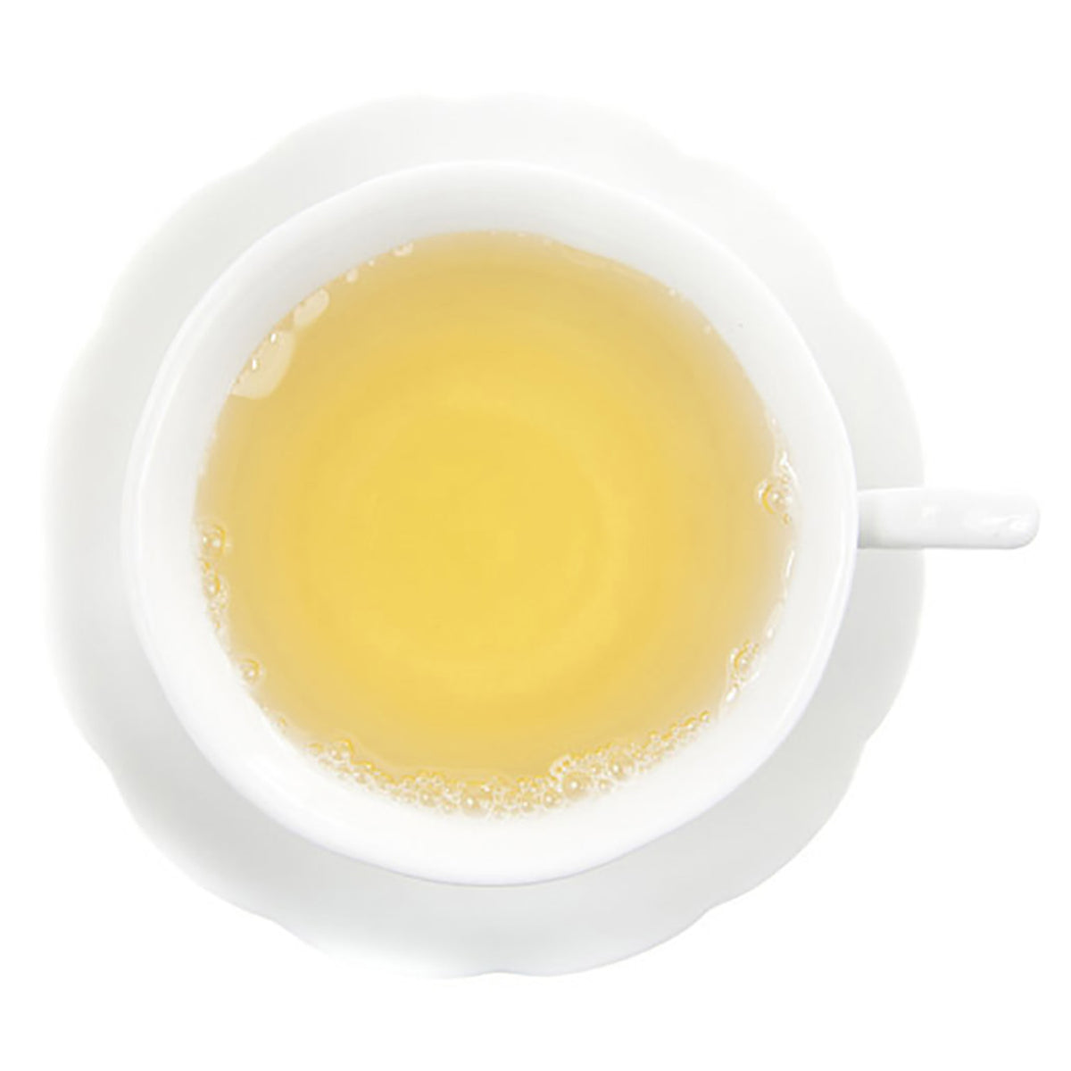 Light yellow hot tea in a white teacup on a white saucer on a white background