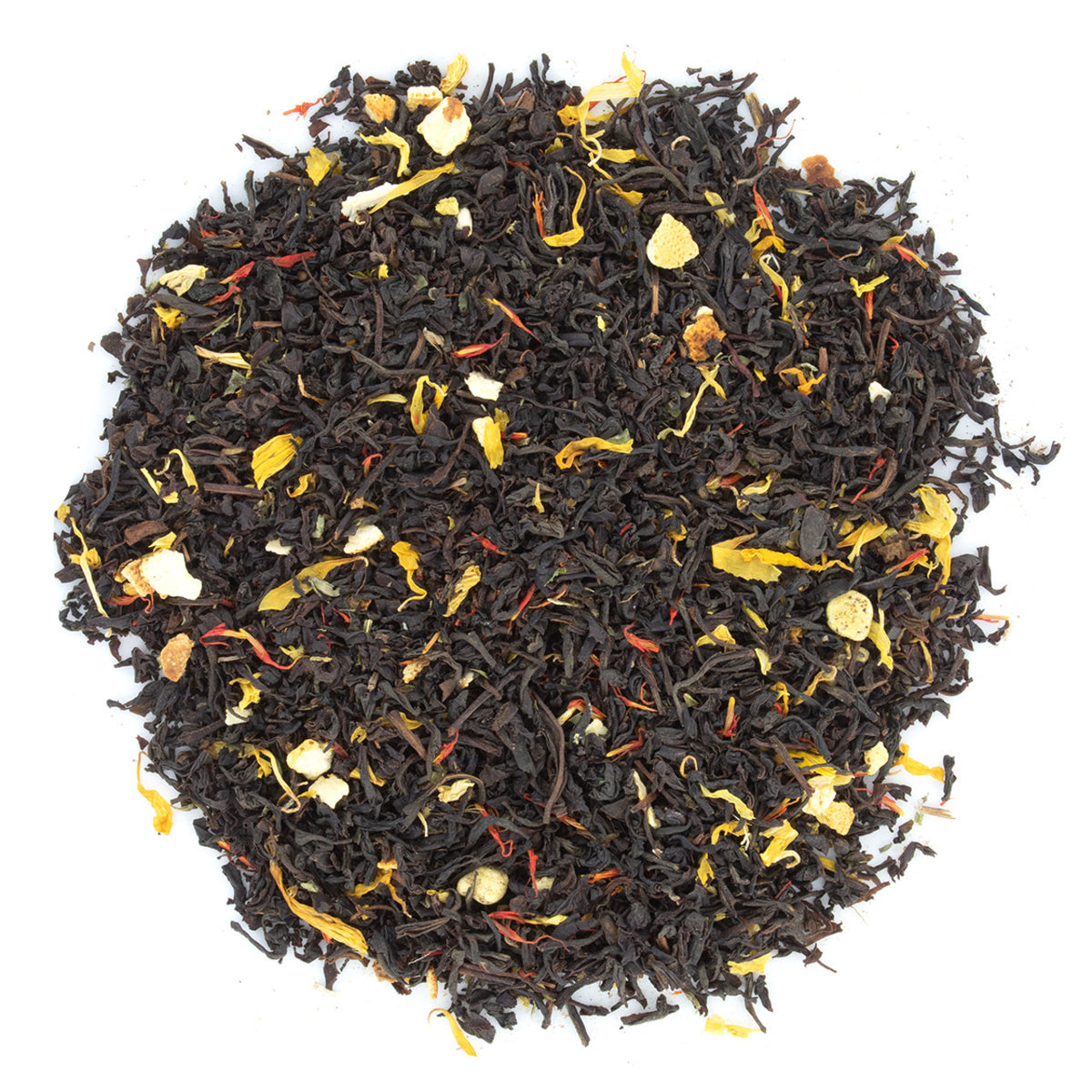 A close-up of loose leaf black tea with pieces of orange and cocoa visible among the leaves.