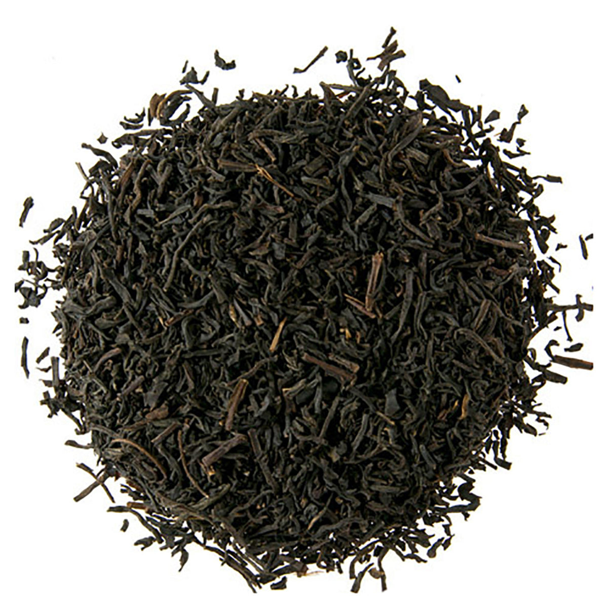Close-up of black tea leaves on a white background