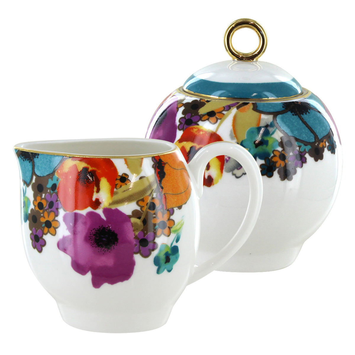 Colorful floral teacup and matching teapot on a white background