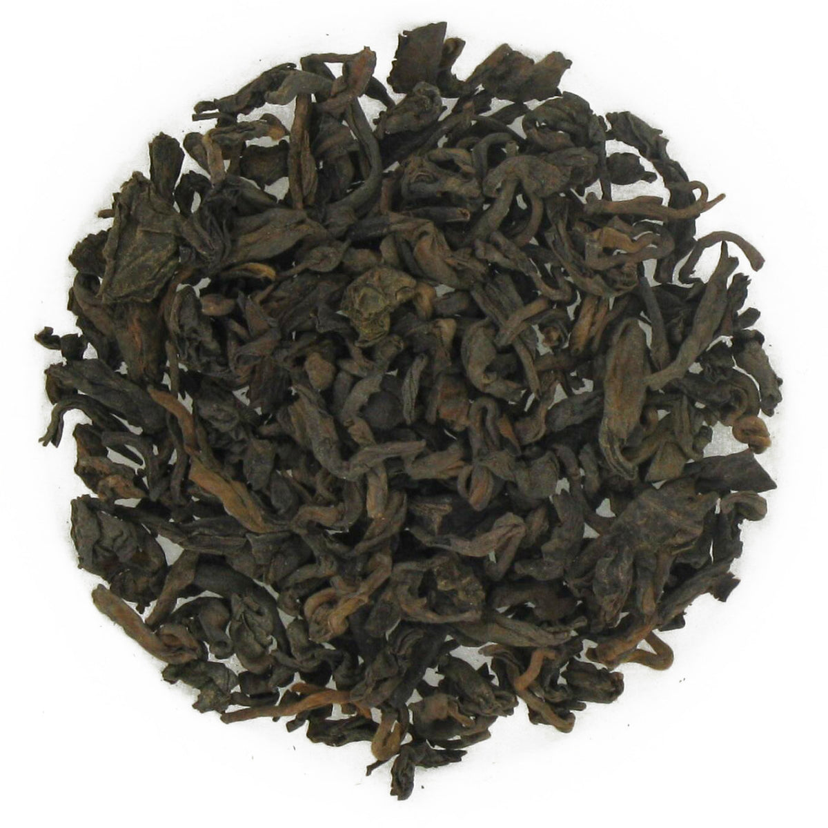 Dry tea leaves on a white background