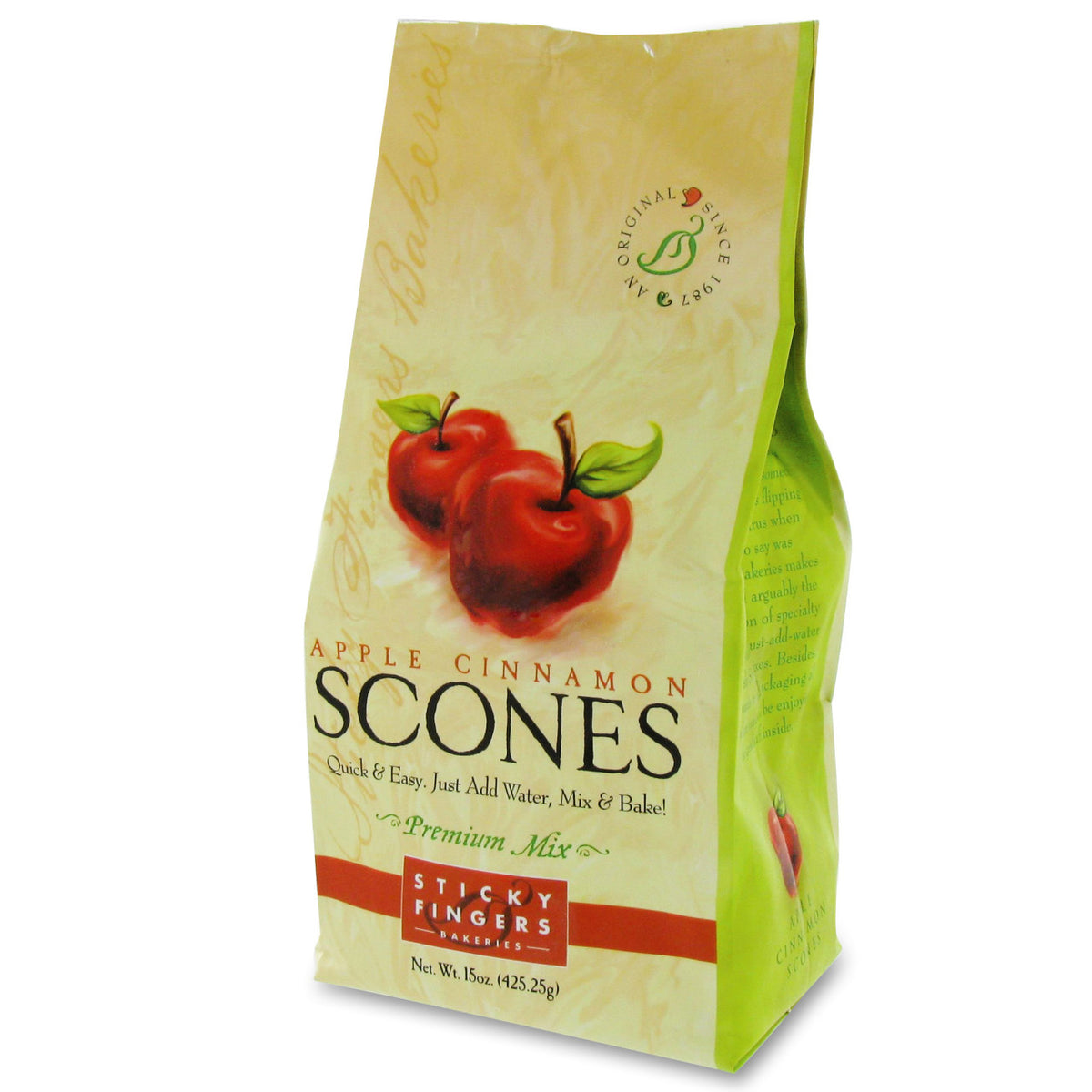 Bag of Apple Cinnamon Scones mix with red apples on a white background
