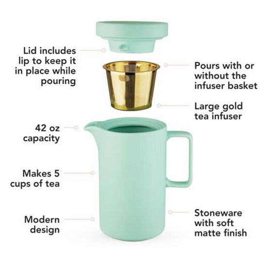 Mint green tea pot pitcher with gold infuser basket on a white background