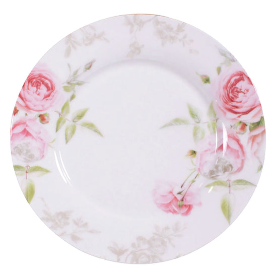 Round ceramic plate with floral design on a white background