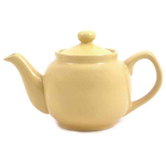 A beige ceramic teapot with a lid, spout, and handle.