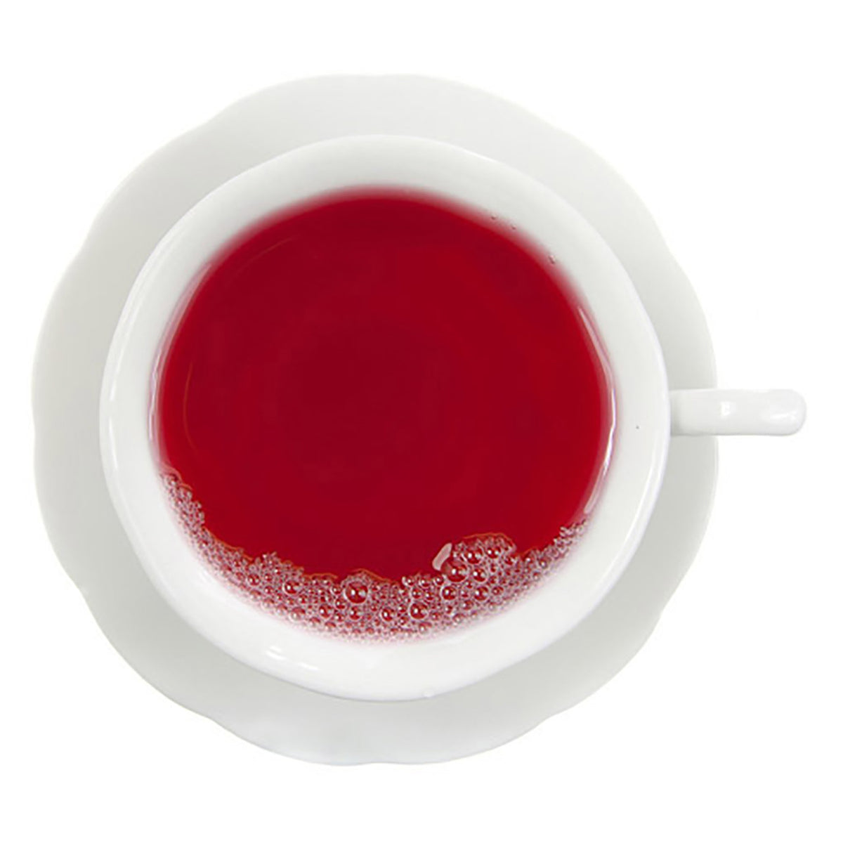 White teacup filled with red hot tea on a white background