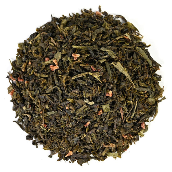 Loose-leaf green tea leaves in a pile