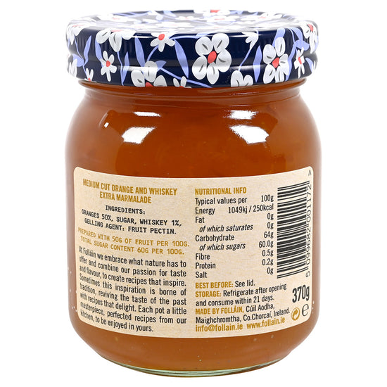 Back side of a jar of Folláin whiskey marmalade showing the ingredient label.