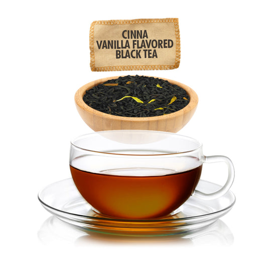Cinna Vanilla Flavored Black Tea with a cup of tea and tea leaves in a wooden bowl on a white background