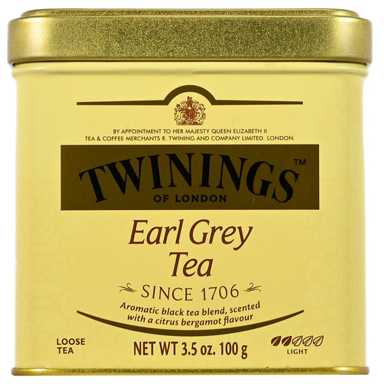 Twinings Earl Grey Tea canister with gold lid and yellow body.