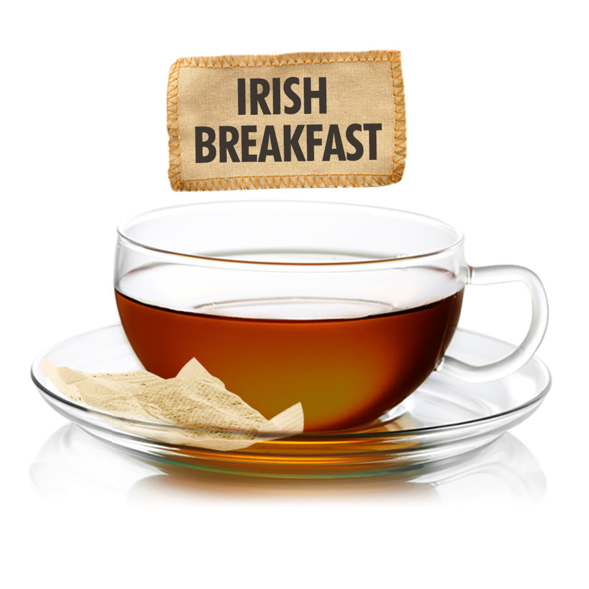 Glass cup of amber colored black tea with a tea bag labeled 'Irish Breakfast' on a white background