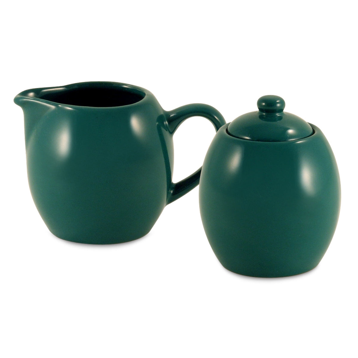 Green ceramic creamer and sugar bowl set on a white background