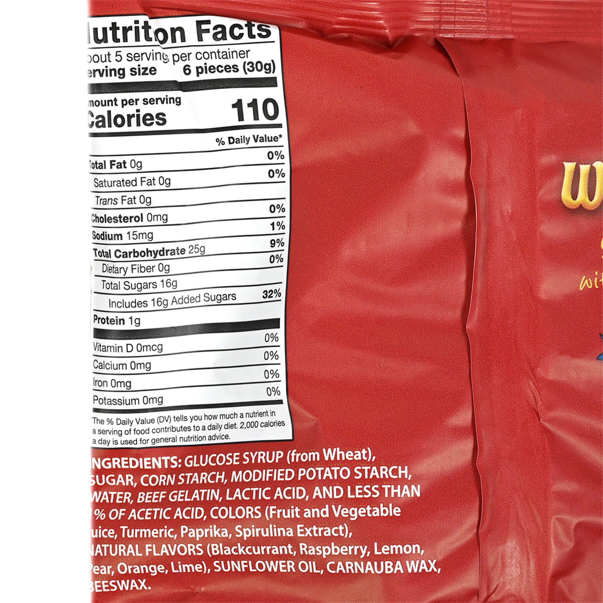 Bag side of a red bag of Norfolk Manor Wine Gums gummy candies featuring Nutrition facts.
