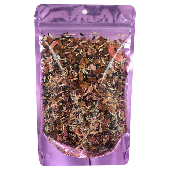 Purple packaging of dried tea leaves on a white background
